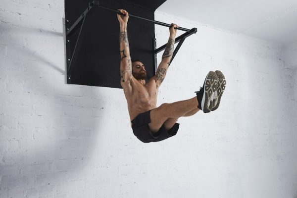 strong-tattooed-athlete-shows-how-calisthenic-moves-step-by-step-full-leg-rises-pull-bar-medium-position_346278-1567.jpg Endurance with Pullups